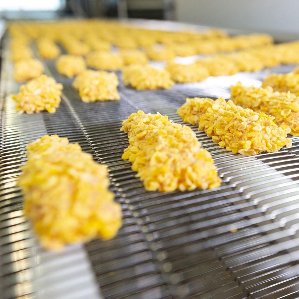 Industrial breadcrumb coating process for chicken products